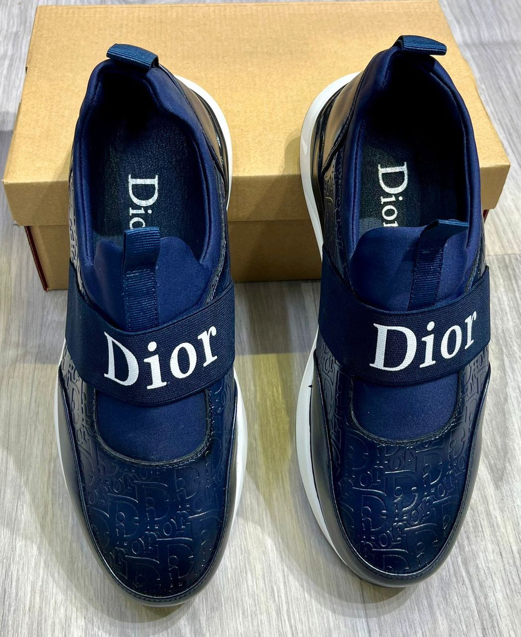 Berluty Dior et Louis Vuitton