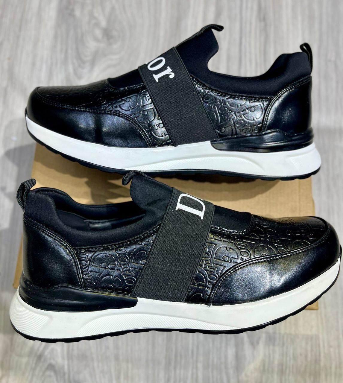 Berluty Dior et Louis Vuitton