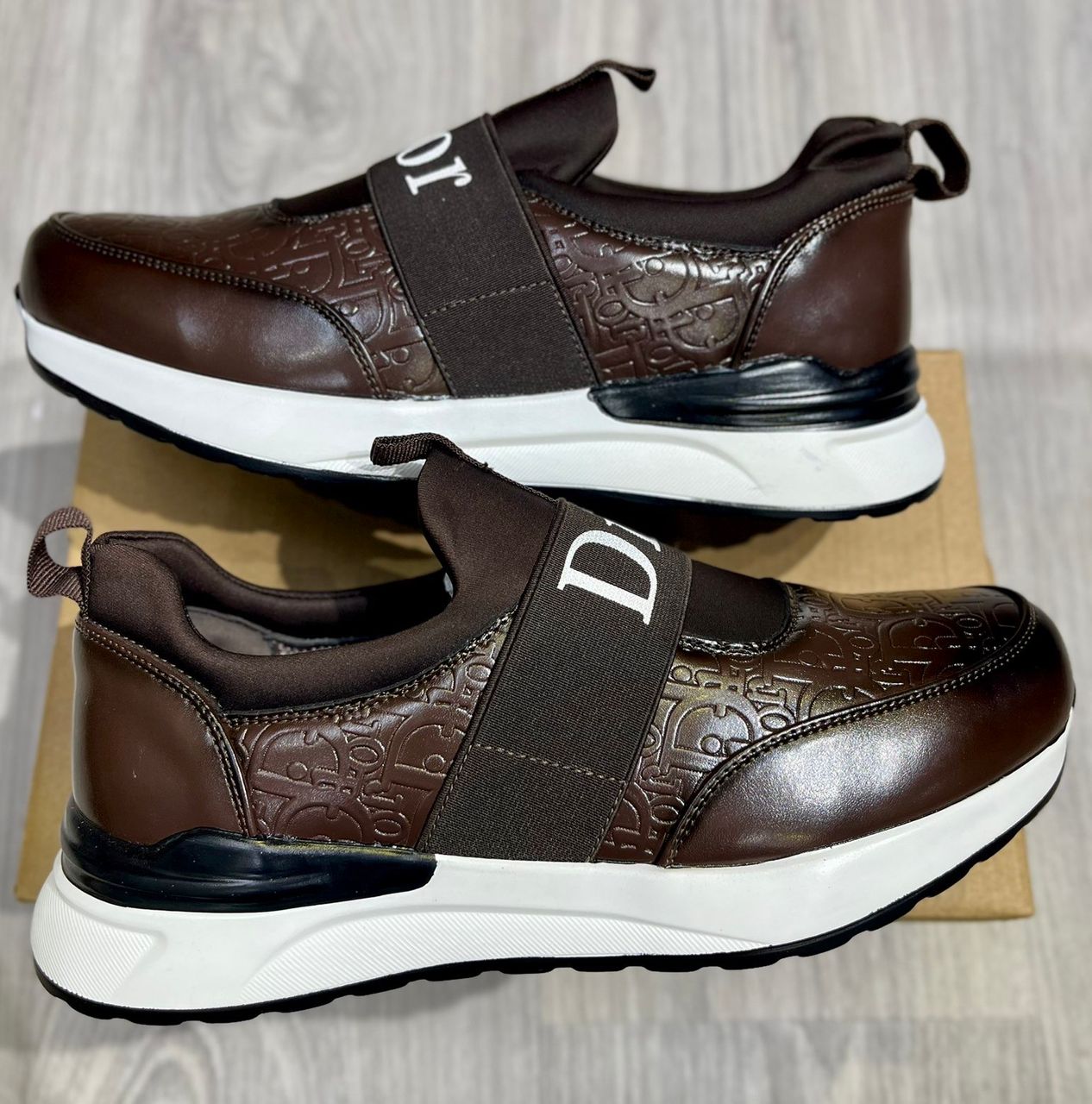 Berluty Dior et Louis Vuitton