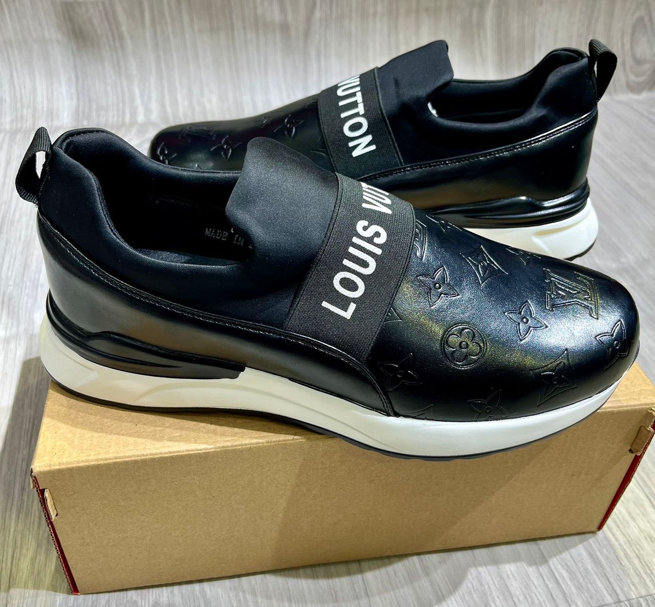 Berluty Dior et Louis Vuitton